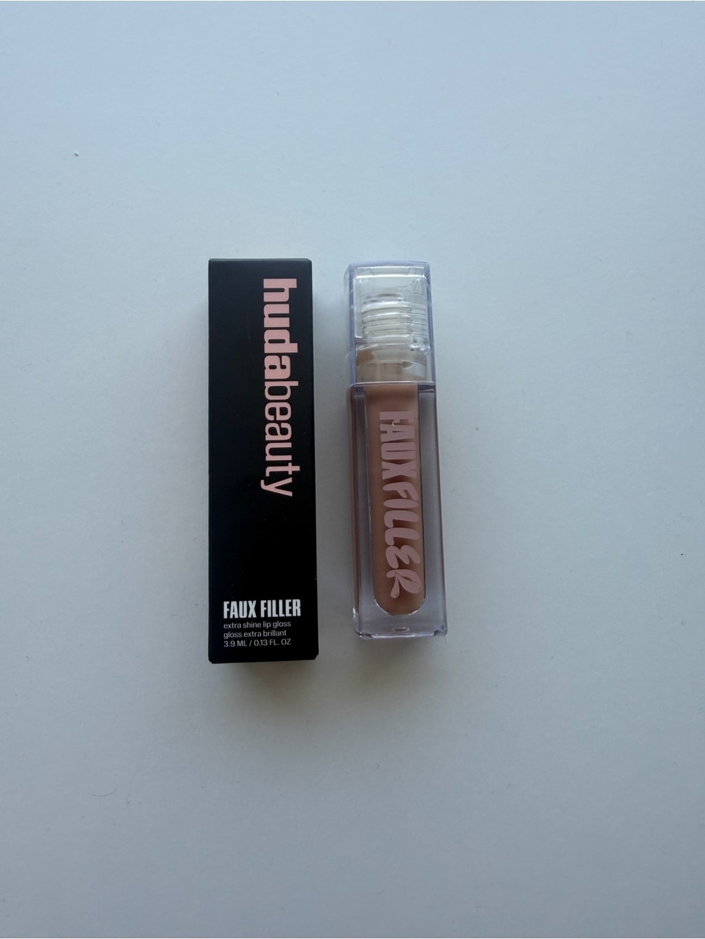 HUDA BEAUTY Faux Filler
Extra Shine Lip Gloss - MidCealer